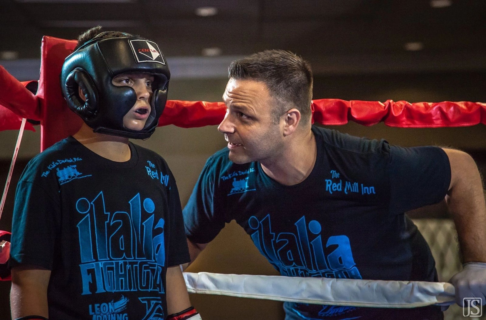 Jim Andrello coaching a fighter in the corner